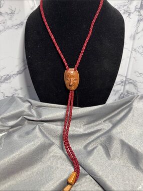 VTG Source Unknown Brown Hand-Carved Mask Pendant on Red Cord